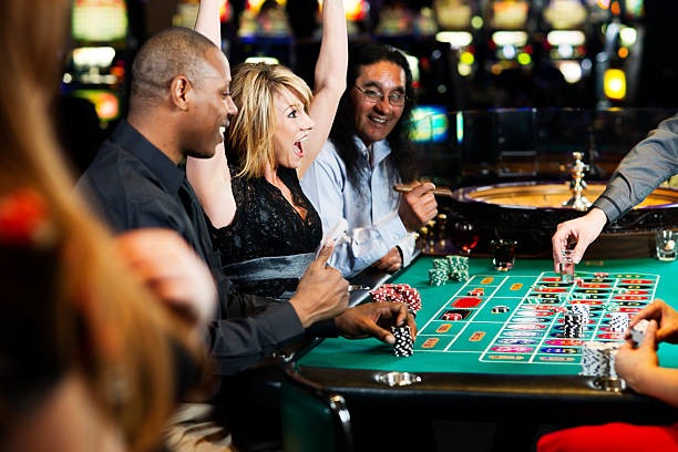 Live table studio with roulette and blackjack layouts
